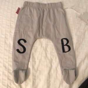 Grey pants. New with tags. Initialed SB